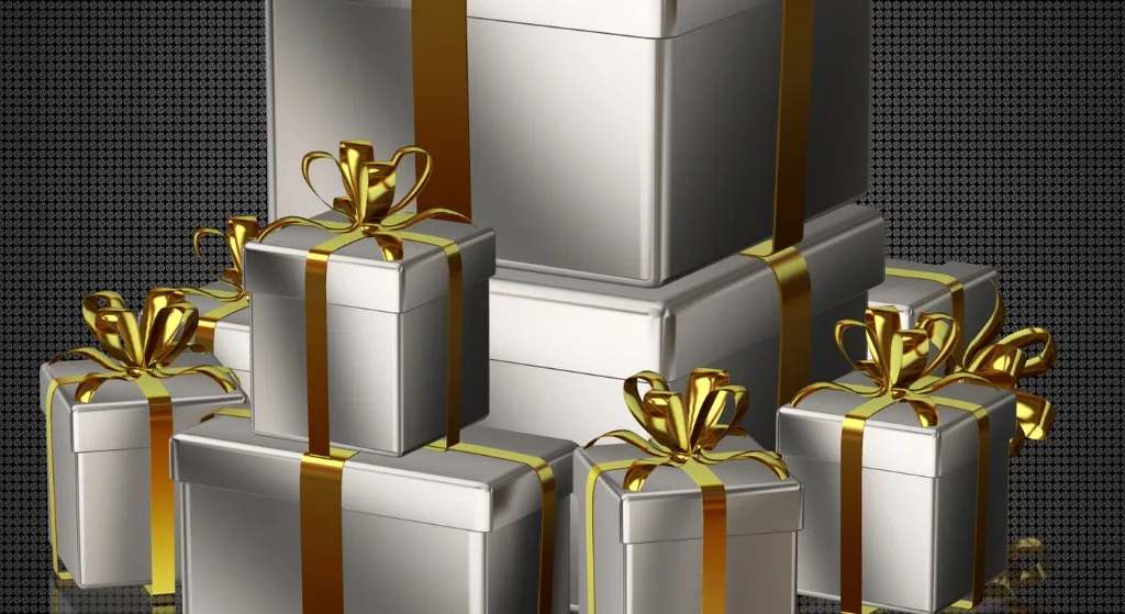 Luxurious silver gift boxes with gold ribbon, perfect for holidays and special occasions